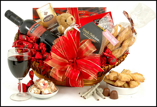Anniversary gift hamper - Consist of wine, goodies, soft toys and chocolates Anniversary gift hamper - Consist of wine, goodies, soft toys and chocolates